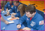 Shuttle Crew Signs Autographs