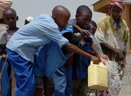 Children Get Fresh Water from the US Navy