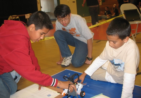 Young Students Work with Robotics