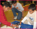Young Students Work with Robotics