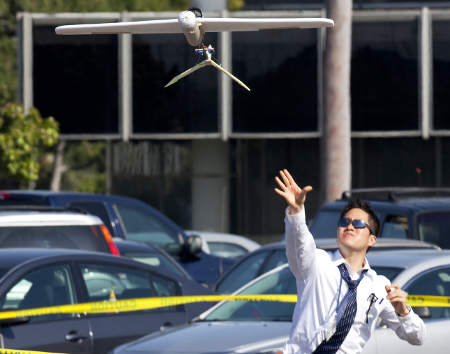 A Northrop Employee Tosses Hawthorne's Plane into the Air