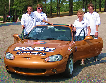 Chris Tolbert's Students Pose with thier Electic Car