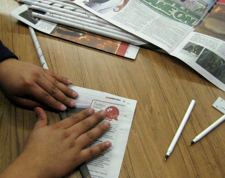 Rolling Newspaper for Building a Paper Tower