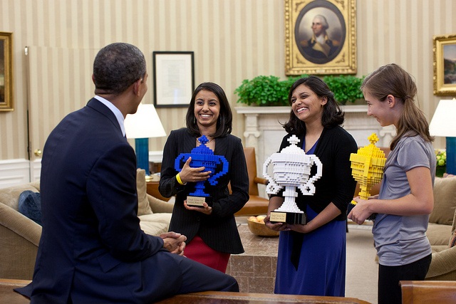 President Barack Obama congratulates Google Science Fair winners, from left, Naomi Shah, Shree Bose, and Lauren Hodge in the Oval Office, Oct. 3, 2011. (Official White House Photo by Pete Souza) This official White House photograph is being made available only for publication by news organizations and/or for personal use printing by the subject(s) of the photograph. The photograph may not be manipulated in any way and may not be used in commercial or political materials, advertisements, emails, products, promotions that in any way suggests approval or endorsement of the President, the First Family, or the White House.Ê