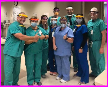 Lake Regional Hospital medical workers with 3D printed face shields made by local high school students
